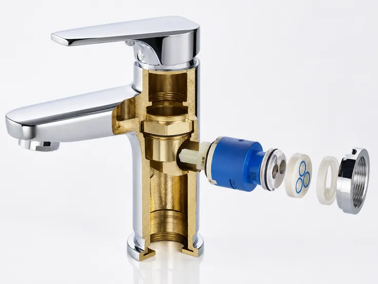 Bathroom sink faucet technical detail — brass body and ceramic disc cartridge construction