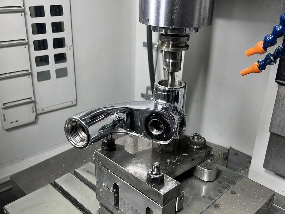 CNC machining of valve seat interface on chrome bathroom faucet body