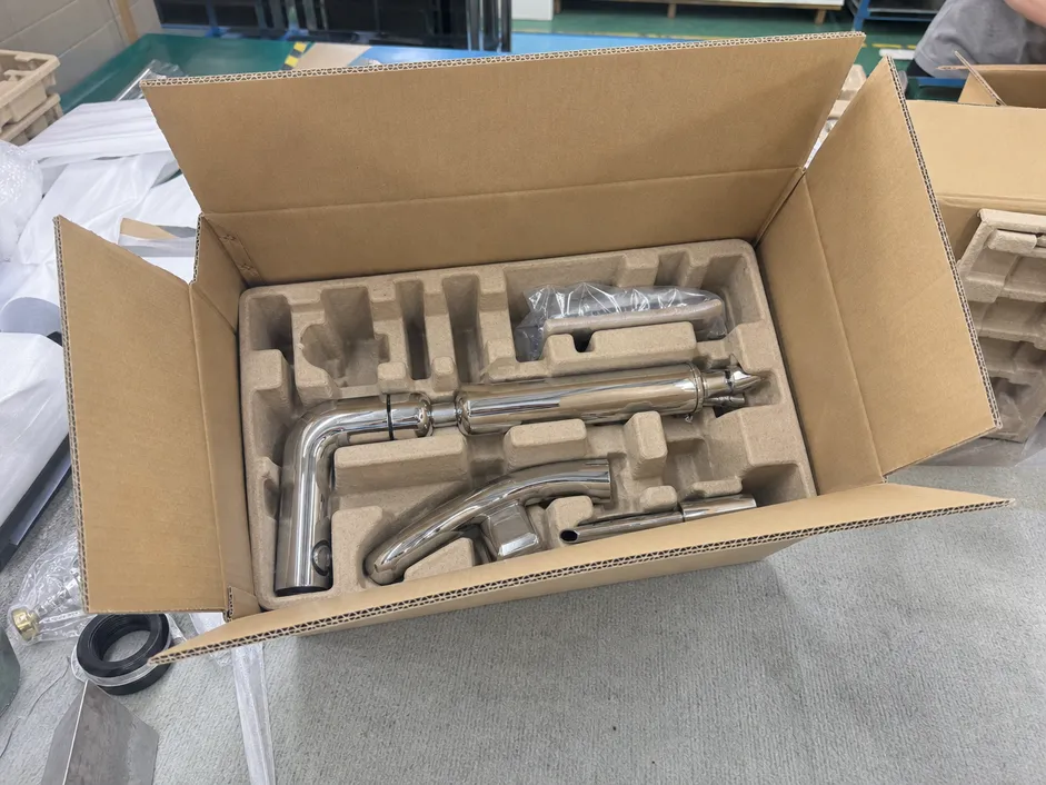 Chrome bathroom faucet export packaging with molded pulp inserts in double-wall corrugated carton