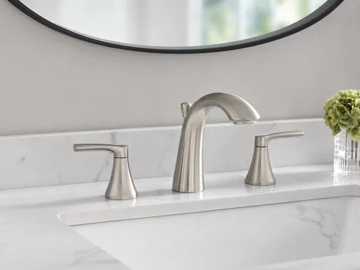 Brushed nickel bathroom faucet with lacquer-sealed texture finish