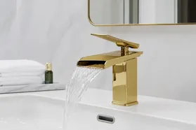 Waterfall bathroom faucet with PVD gold finish for Middle East hospitality projects