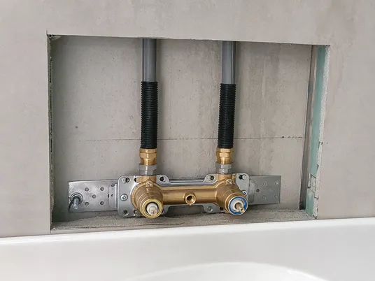 Wall mount bathroom faucet with supply lines inside wall cavity