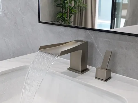 Waterfall bathroom faucet with wide spout and sheet-flow water delivery