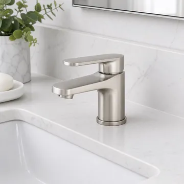 Low profile bathroom faucet in brushed nickel finish
