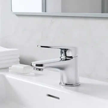 Low profile bathroom faucet in polished chrome finish
