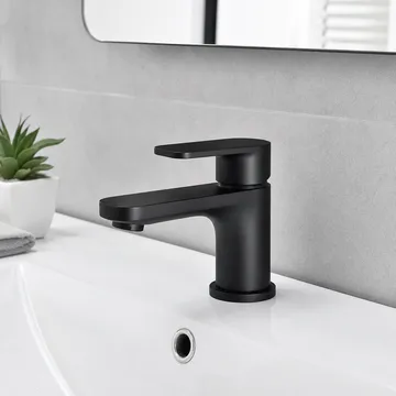 Low profile bathroom faucet in matte black finish