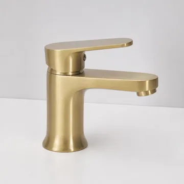 Low profile bathroom faucet in PVD brushed gold finish