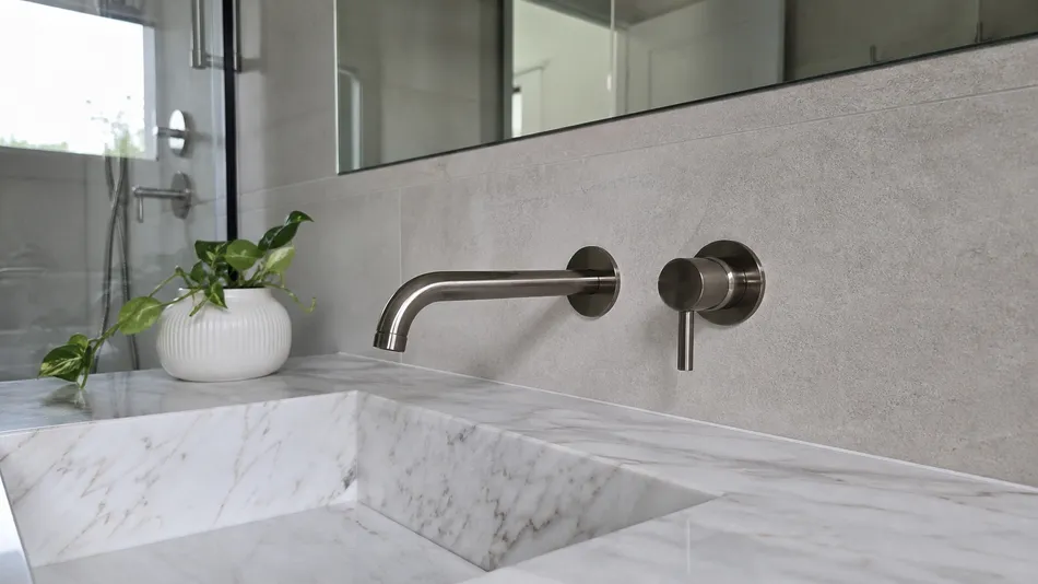 Wall mount faucet in high-end custom home build