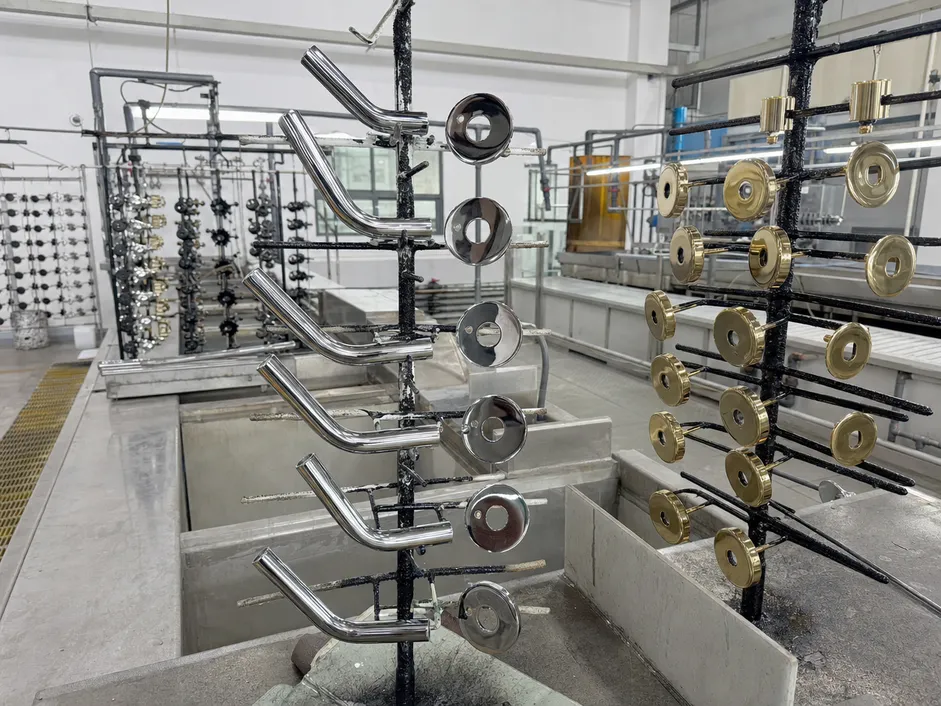 Wall mount faucet trim components going through electroplating and PVD finishing process in Foshan factory