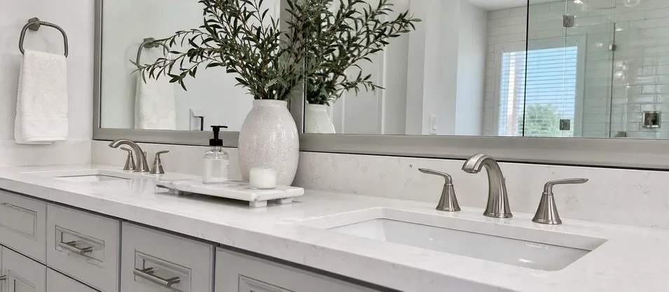 Premium residential master bathroom with widespread faucet in brushed nickel finish