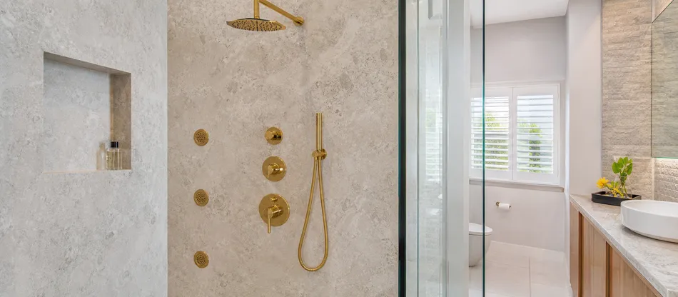 Boutique hotel bathroom with concealed thermostatic shower system