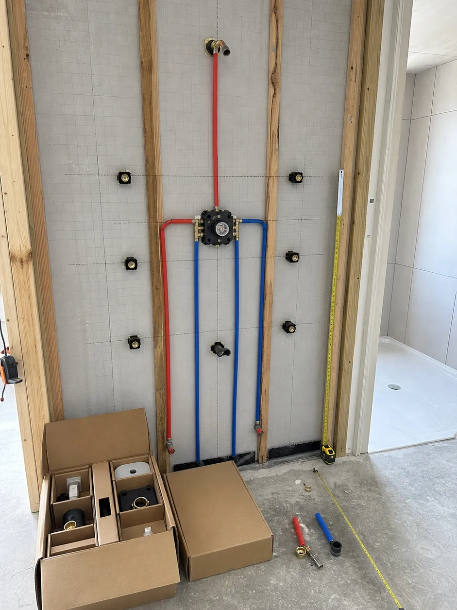 Concealed shower system rough-in installation parameters and outlet positioning