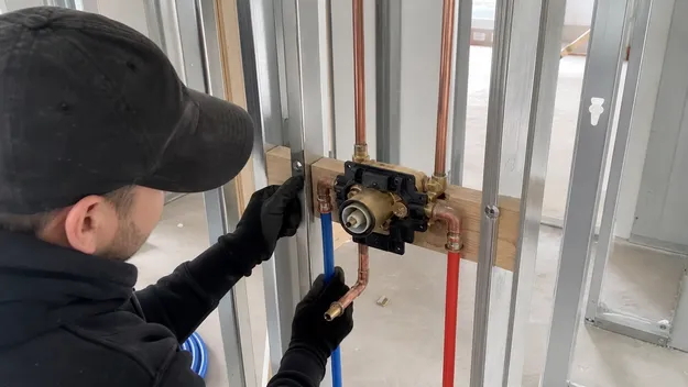 Concealed shower valve rough-in installation during new construction framing