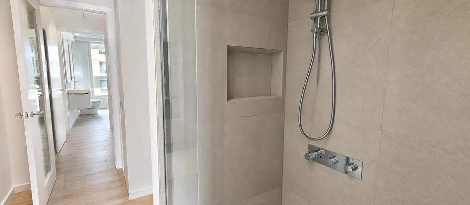 Multi-unit residential development specifying thermostatic concealed shower mixers