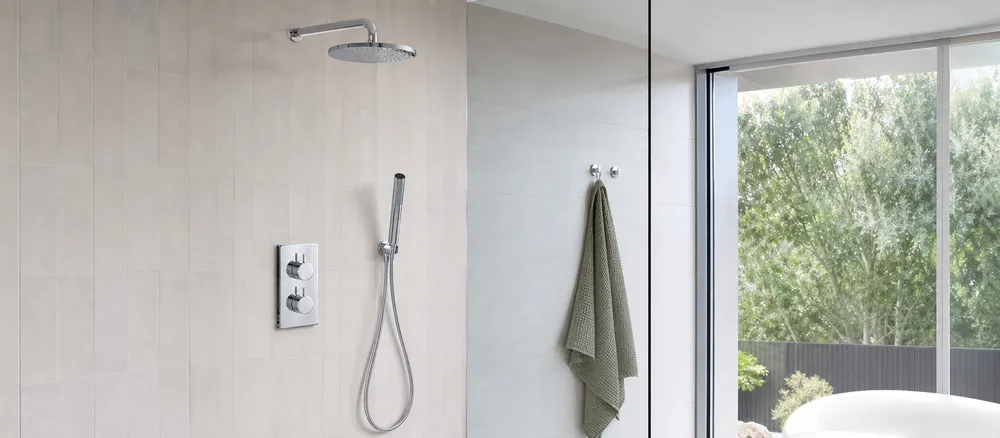 Concealed thermostatic shower mixer for code-compliant markets