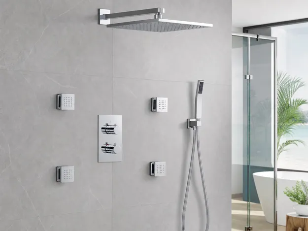Complete concealed shower system with thermostatic mixer, rain head, hand shower, and body jets