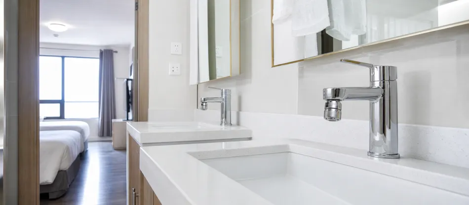 Filter aerators installed at hotel and rental property faucets — bulk supply for property management procurement