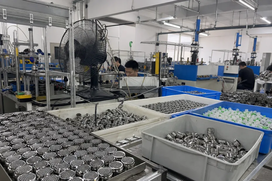 Wfaucet factory floor where aerators and faucet components are manufactured