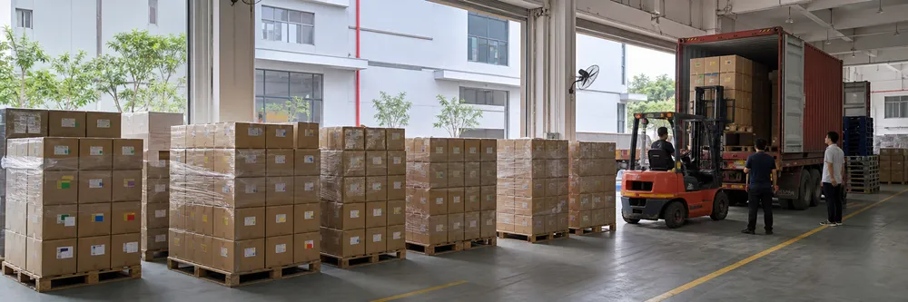Kitchen faucet aerator master cartons stacked for container loading, showing SKU-sorted packing arrangement