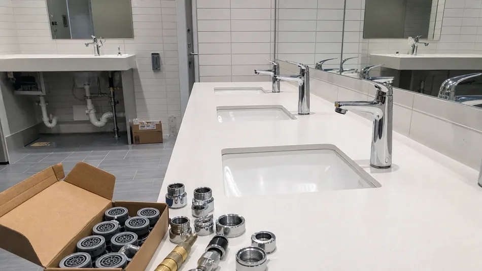 Commercial building LEED certification plumbing specification with low flow aerators
