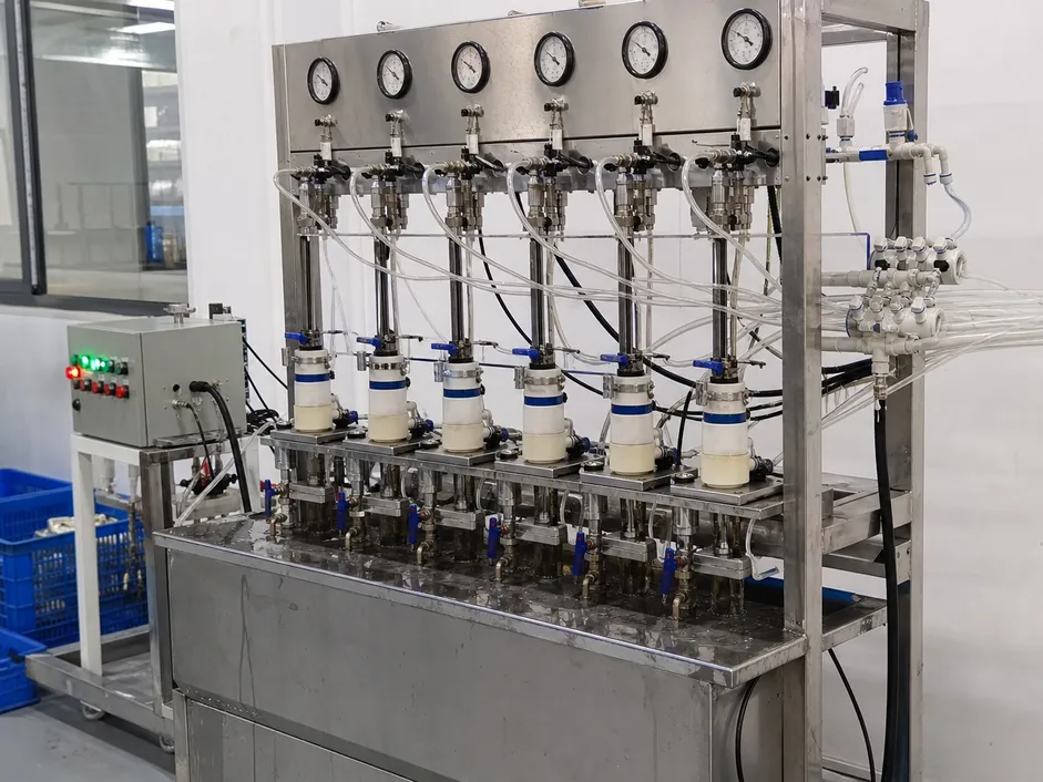 Ceramic disc cartridge endurance testing rig running 500,000-cycle batch validation