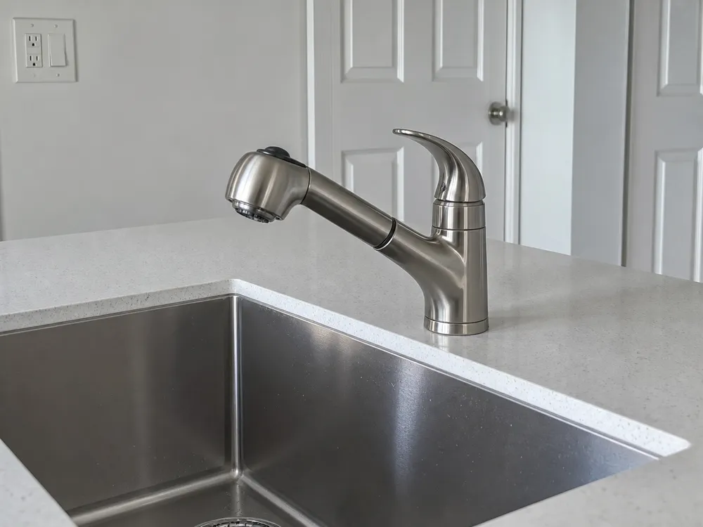 Pull-out swivel brushed nickel kitchen faucet — compact spout with pull-out spray head for smaller sinks