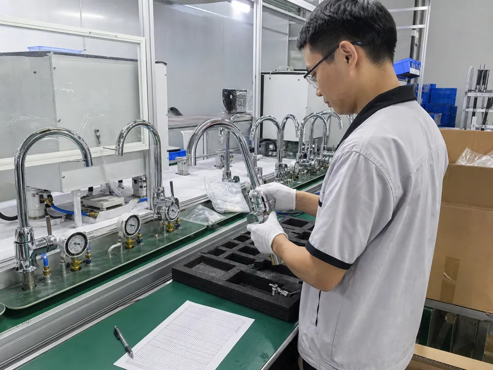 Quality control inspection of gooseneck kitchen faucets on the production line