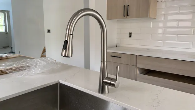 Single handle kitchen faucet in residential renovation setting
