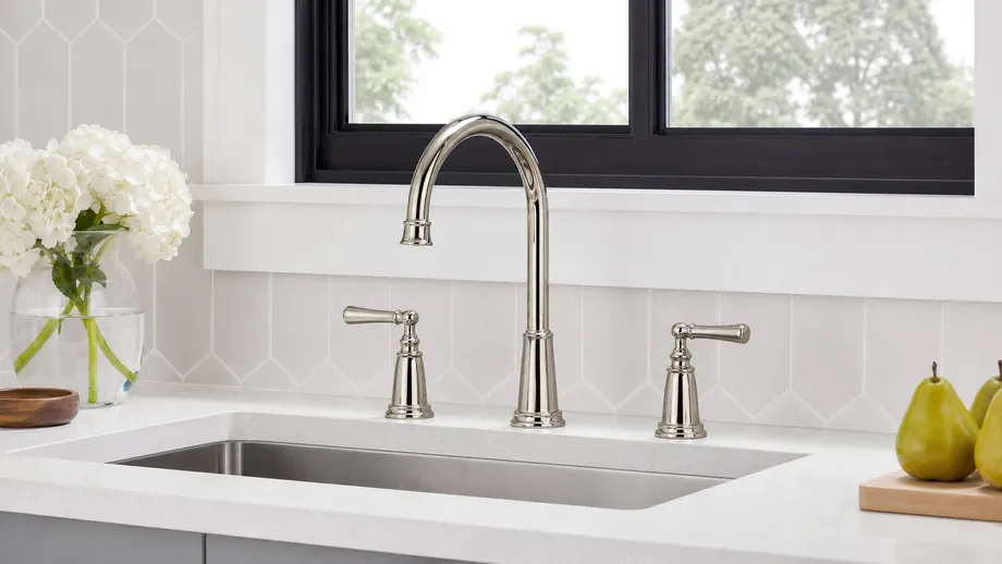 Widespread two handle kitchen faucet showing 8-inch center handle spread