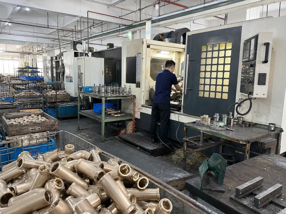 OEM faucet manufacturing facility — brass casting and CNC machining operations at Wfaucet