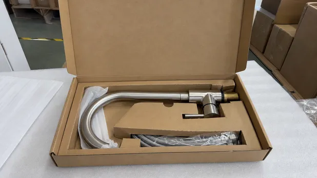 Brushed nickel faucet packaged for e-commerce retail