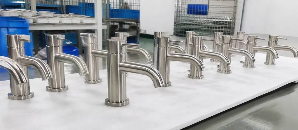 Brushed nickel vanity faucets specified for hotel renovation project