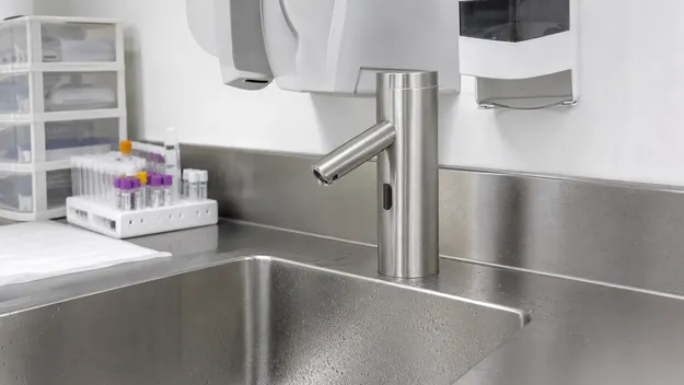 Sensor faucet in healthcare and laboratory facility