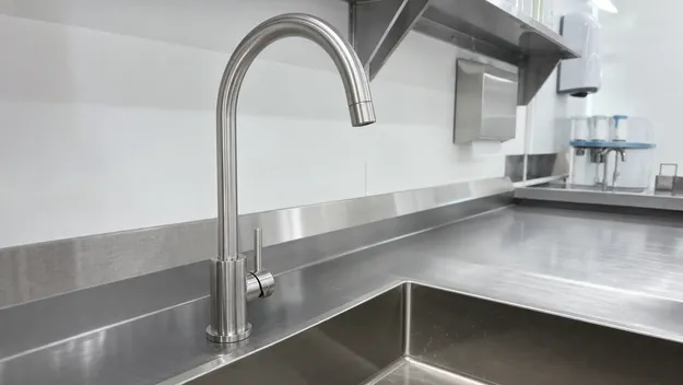304-grade stainless steel faucet in brushed finish for commercial kitchen and healthcare applications