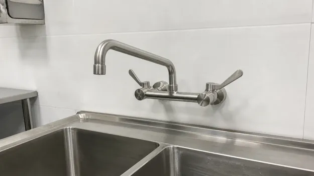 Wall-mount stainless steel sink faucet for commercial and laboratory applications