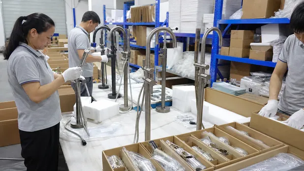 Final quality inspection and packaging of freestanding faucet