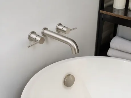 Wall mount bathtub faucet for freestanding tub installations