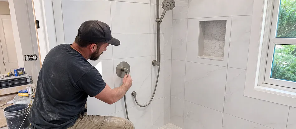 North American residential bathroom renovation with single handle shower faucet installation