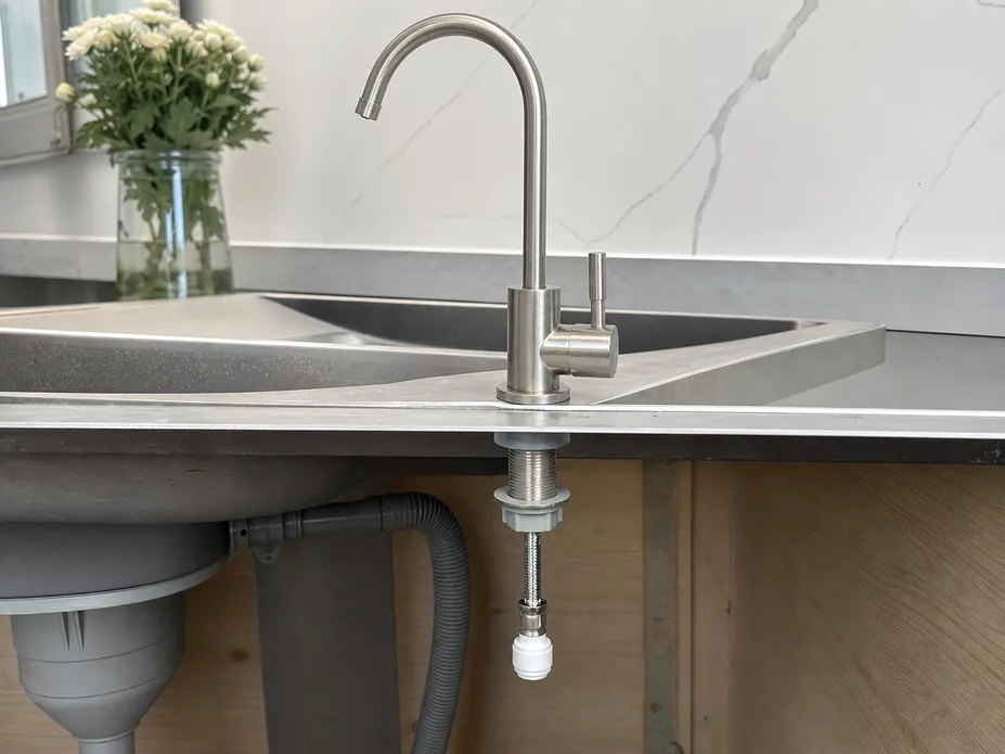 Brushed nickel water filter faucet deck mount installation showing base clearance and mounting hardware
