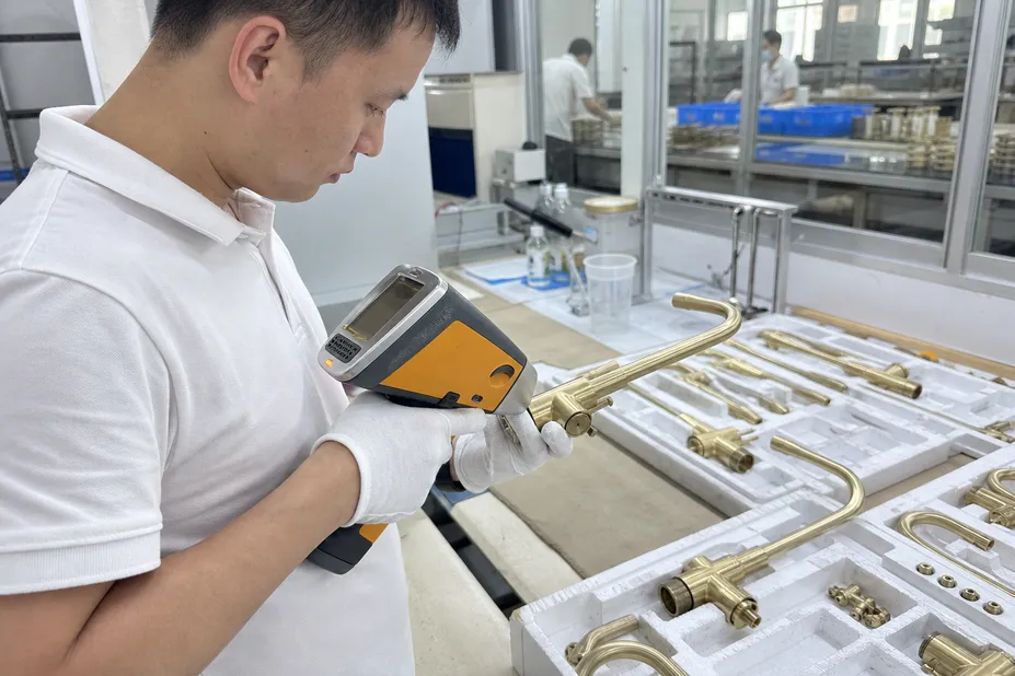 XRF analysis of brass faucet body — lead content testing for NSF/ANSI 61 compliance