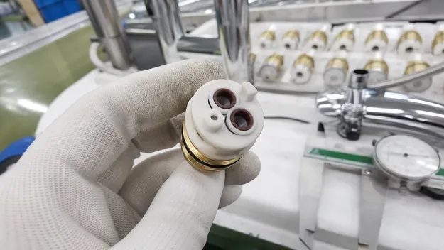 Ceramic disc cartridge with tight flatness tolerance for low-pressure RO systems