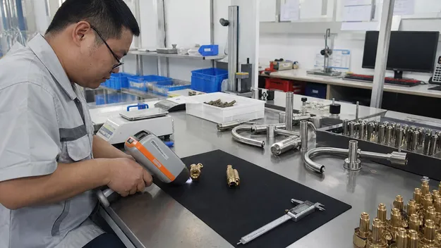 XRF analysis of brass alloy confirming lead content below NSF/ANSI 61 threshold for RO faucet waterway safety